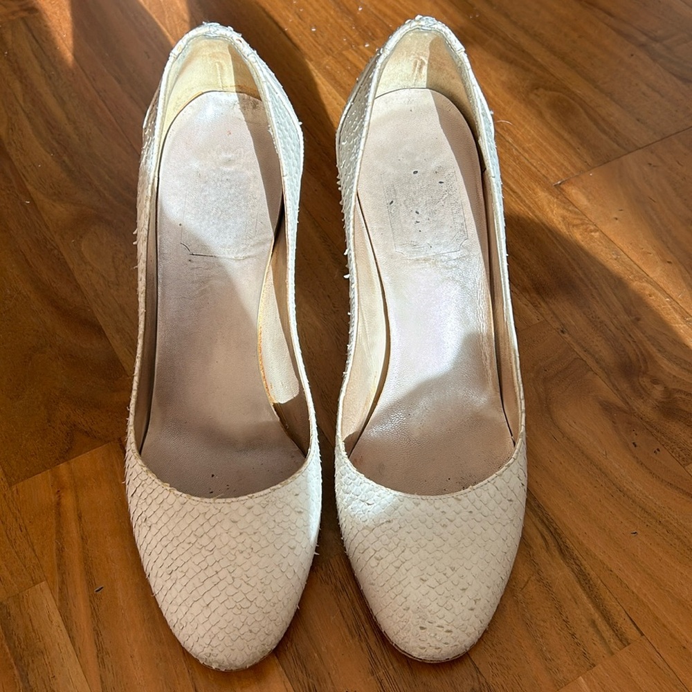 Well worn Dior snakeskin heels